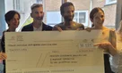 3 Mersen's employees handed over a check of €38,185 to the Institut Curie